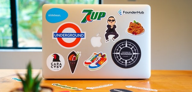 brand stickers on laptop data information